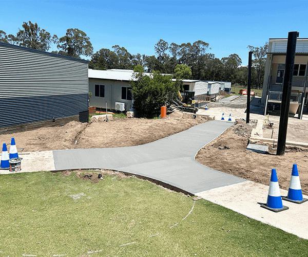Newly paved concrete pathway in a residential area by Said Civil Contractors.
